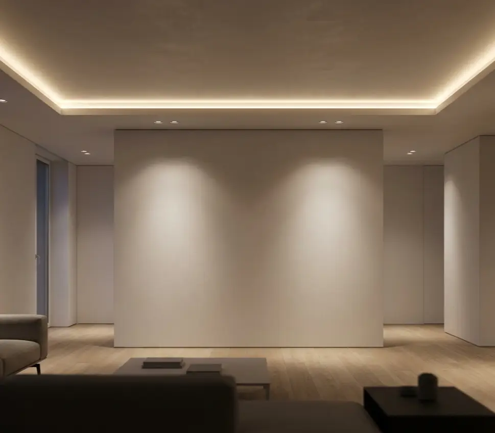 A living room lit by LUMA-6CH: warm cove light around the ceiling and downlights washing a wall